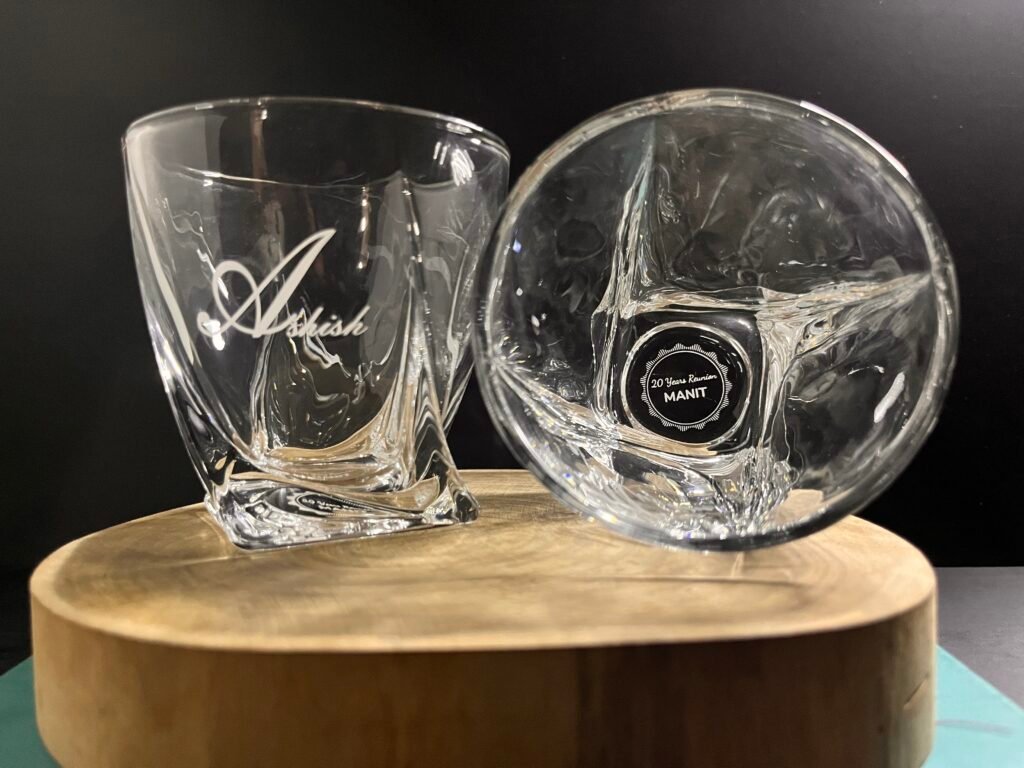 Discover the perfect blend of elegance and personalization with our Personalized Engraved Whiskey Glasses, available online in India. Each glass is meticulously crafted from high-quality, lead-free glass and can be customized with a name monogram, love symbol, and photo engraving, making it an ideal gift for any occasion or a unique addition to your home bar.