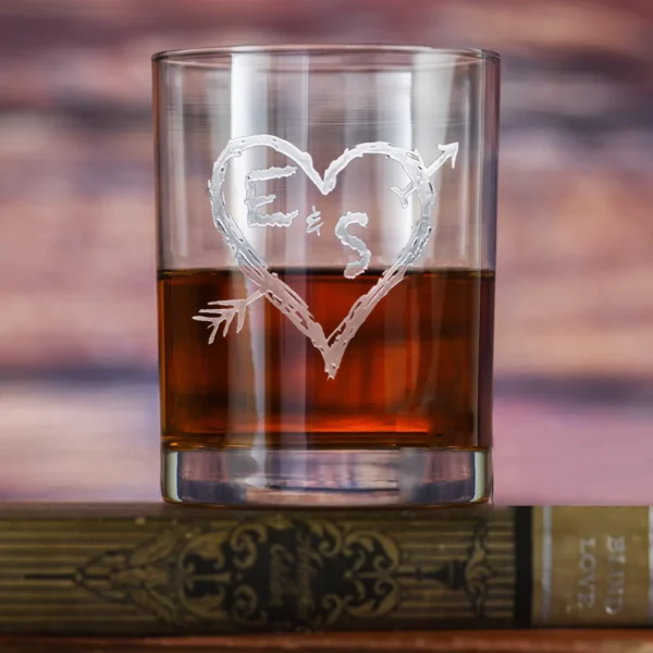 Elevate your whiskey experience with our customized glass, featuring a name monogram, love symbol, and photo engraving. Perfect for gifts, special occasions, or adding a personal touch to your home bar. Crafted from high-quality, lead-free glass, this 10 oz glass ensures a stylish and memorable sip every time.