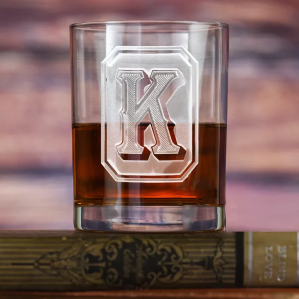 Elevate your whiskey experience with our customized glass, featuring a name monogram, love symbol, and photo engraving. Perfect for gifts, special occasions, or adding a personal touch to your home bar. Crafted from high-quality, lead-free glass, this 10 oz glass ensures a stylish and memorable sip every time.