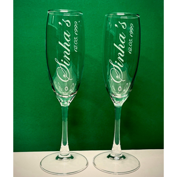 Celebrate in style with our Personalized Champagne Flutes, meticulously crafted to add a touch of elegance to any occasion. These premium champagne glasses are deep engraved to perfection, offering a sophisticated way to enjoy your favorite bubbly.
