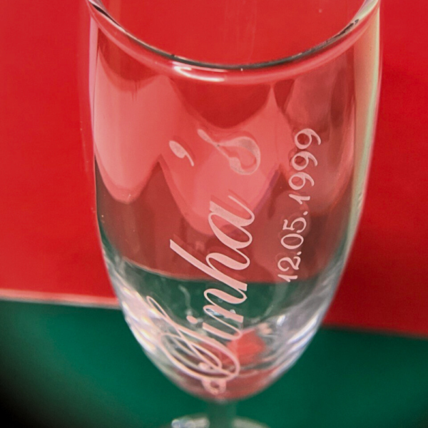 Celebrate in style with our Personalized Champagne Flutes, meticulously crafted to add a touch of elegance to any occasion. These premium champagne glasses are deep engraved to perfection, offering a sophisticated way to enjoy your favorite bubbly.