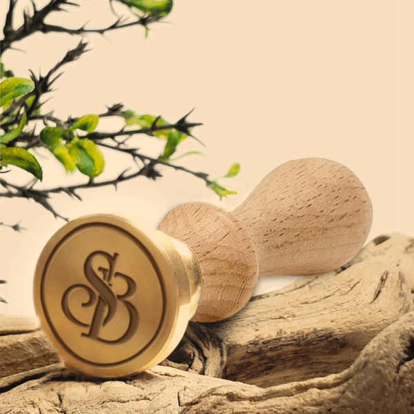 Create a unique and personalized wax seal stamp featuring an intertwined monogram.