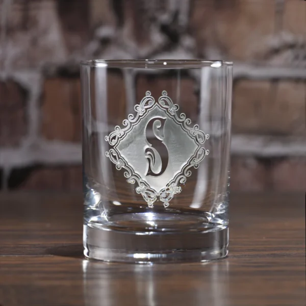 Elevate your whiskey experience with our customized glass, featuring a name monogram, love symbol, and photo engraving. Perfect for gifts, special occasions, or adding a personal touch to your home bar. Crafted from high-quality, lead-free glass, this 10 oz glass ensures a stylish and memorable sip every time.